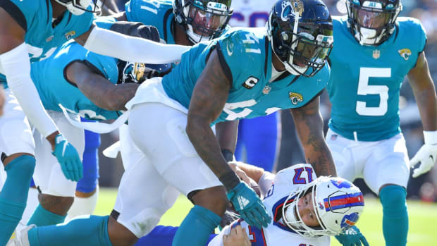 Jacksonville Jaguars linebacker Josh Allen (41) makes a second quarter sack on Buffalo Bills quarterback Josh Allen (17). The Jaguars were tied with the Bills 6 to 6 at the end of the first half. The Jacksonville Jaguars hosted the Buffalo Bills at TIAA Bank Field in Jacksonville, FL, Sunday, November 7, 2021. [Bob Self/Florida Times-Union]

Jki 110721 Bsjagsvsbuffalo 4